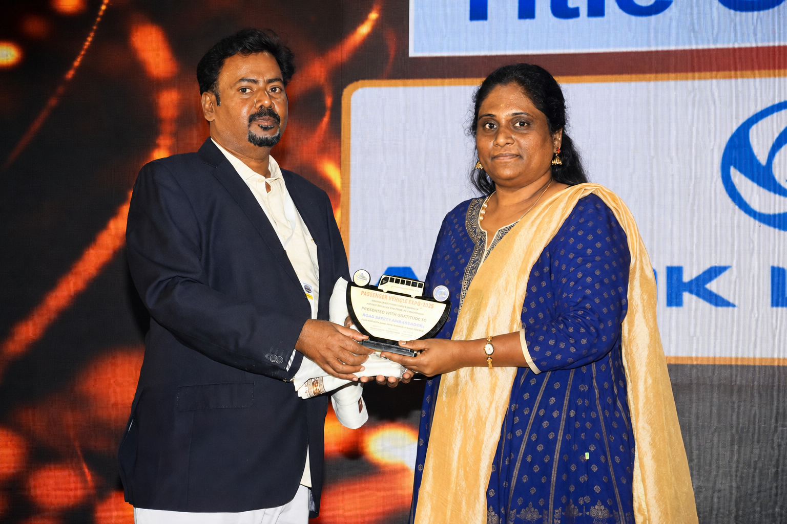 Dr. V. Amudhan being recognised as Road Safety Ambassador at Passenger Vehicle Expo 2025